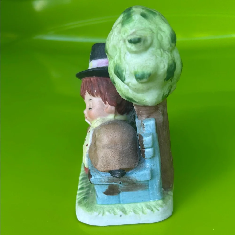 Charming Figurine with Sleeping Child and Cat